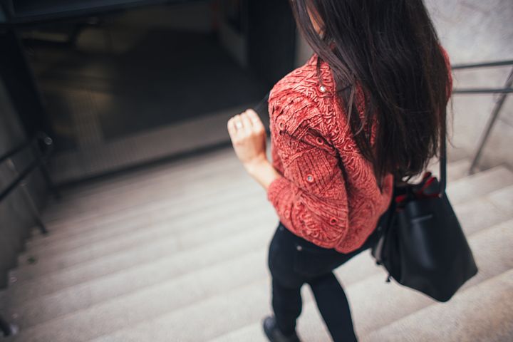 Woman-going-down-stairs